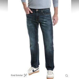 A darker blue , slimmy fit, 7 for all Mankind denim jean